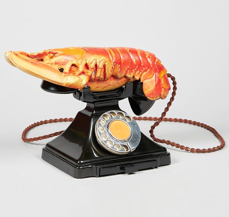 Rotary phone with a lobster on the handset.