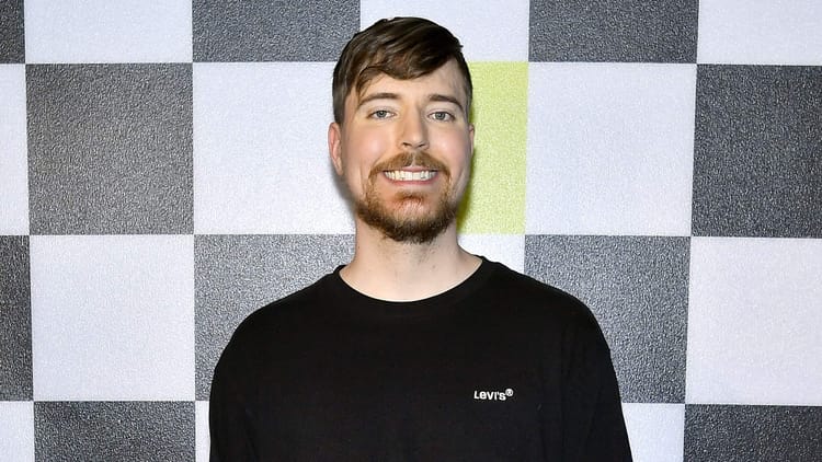 Image of Jimmy Donaldson, better known as MrBeast, against a black and white checkered background.