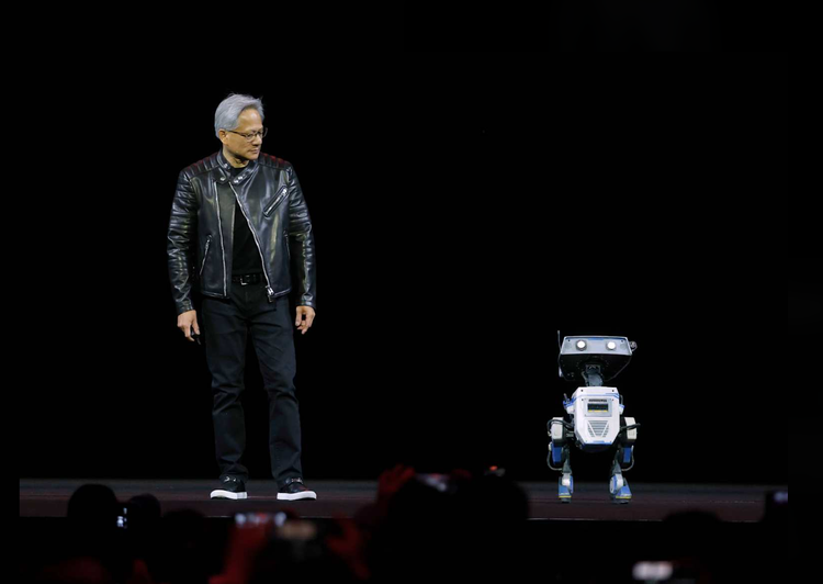 NVIDIA CEO Jensen Huang delivers keynote at Developers Conference while standing next to a short robot.