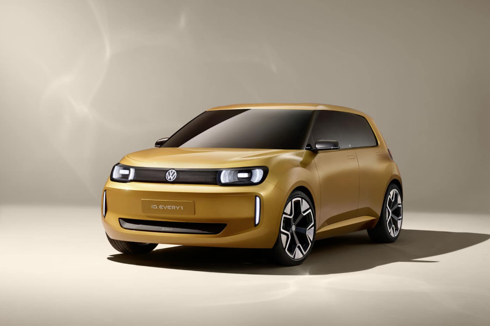 Exterior view of Volkswagen-Rivian electric vehicle in deep golden color.